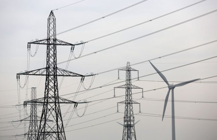 Power Grid Profits Should Fund Energy Debt, UK Lawmakers Say